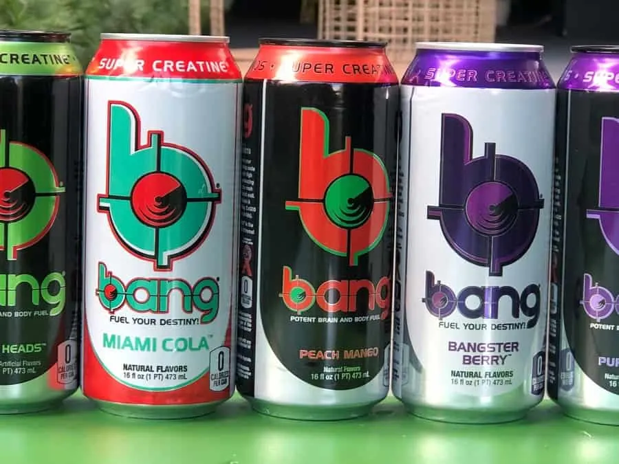 Multiple flavors of Bang on a gree table.