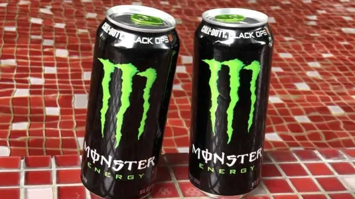Original monster energy drinks on a table