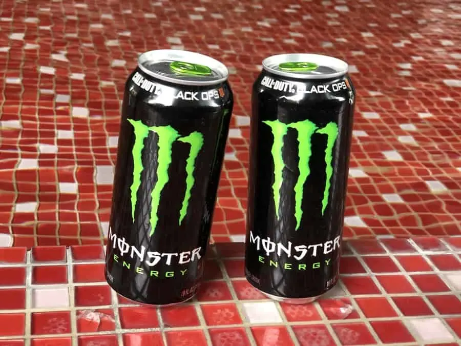 Original monster energy drinks on a table