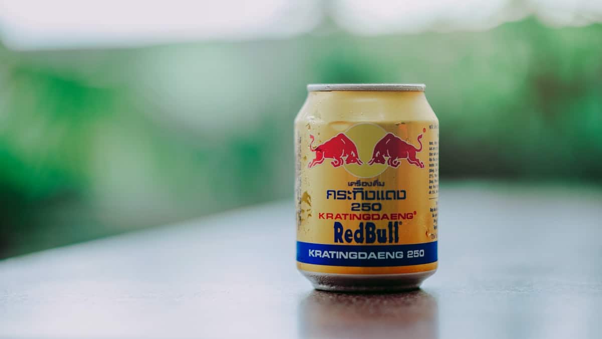 Close-up Photography of Red Bull in Can