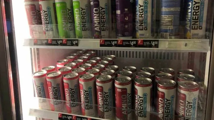 Different flavors of Amino Energy drink in a freezer.