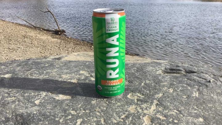 Can Of Runa Clean Placed on Rock