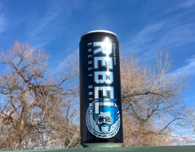 A can of Blue Rebel with sky as background