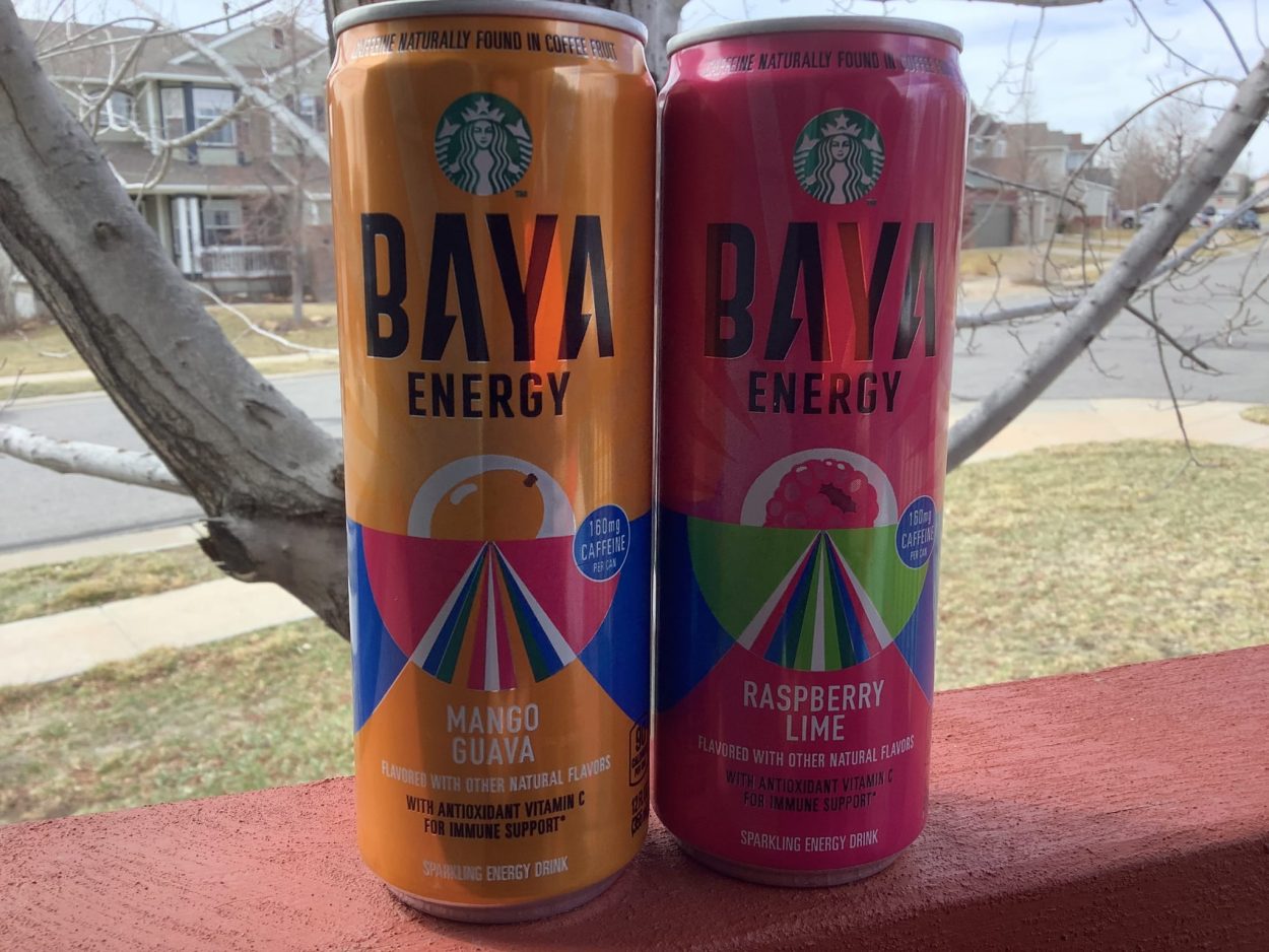 Two cans of Baya energy drink in Mango Guava and Raspberry flavors