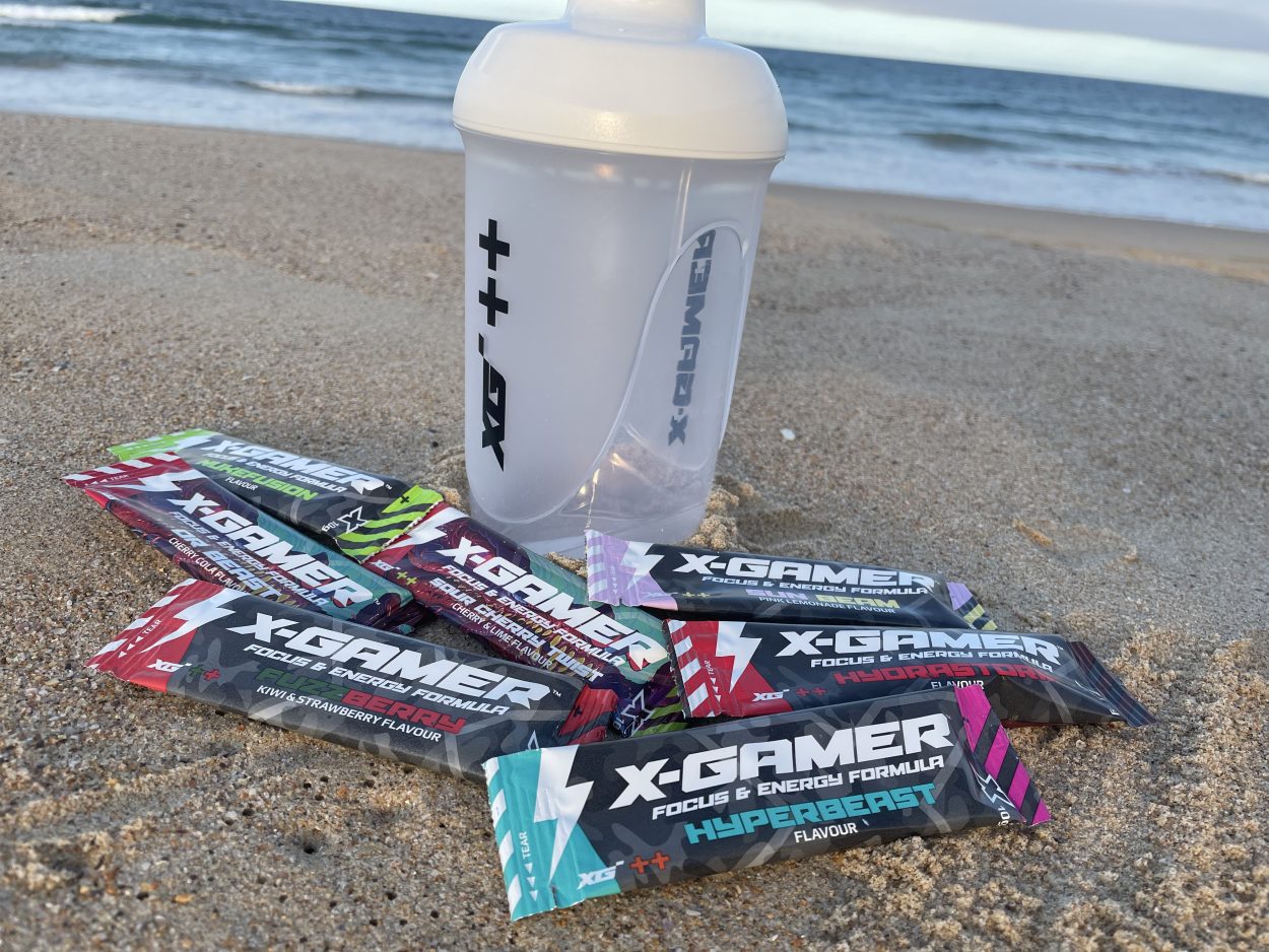 A X-Gamer bottle and several packets of X-Gamer 