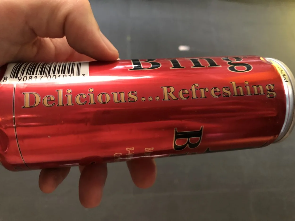 "Delicious...Refreshing" written on a can of Bing energy drink