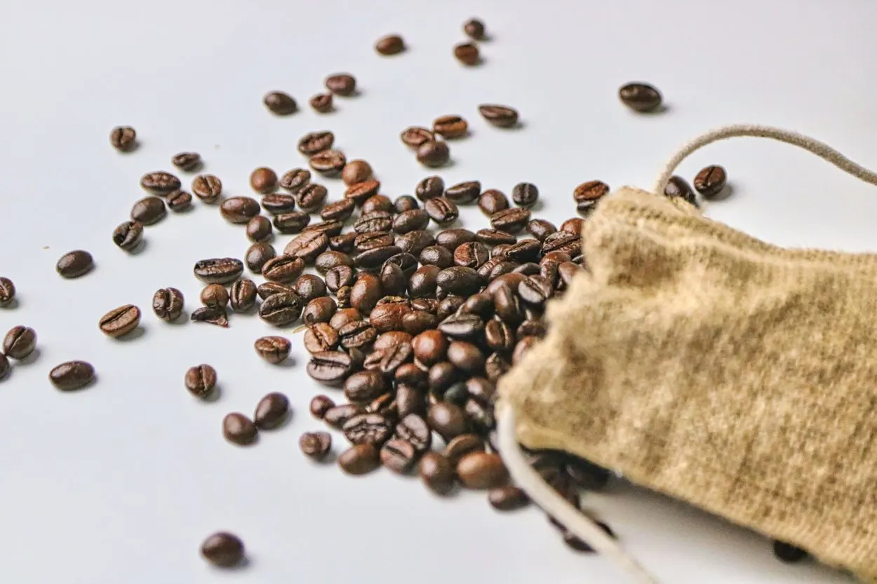 A brown bag of coffee beans