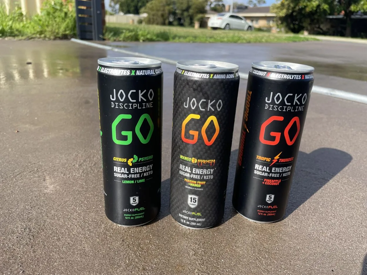 Three cans of Jocko Go in different flavors