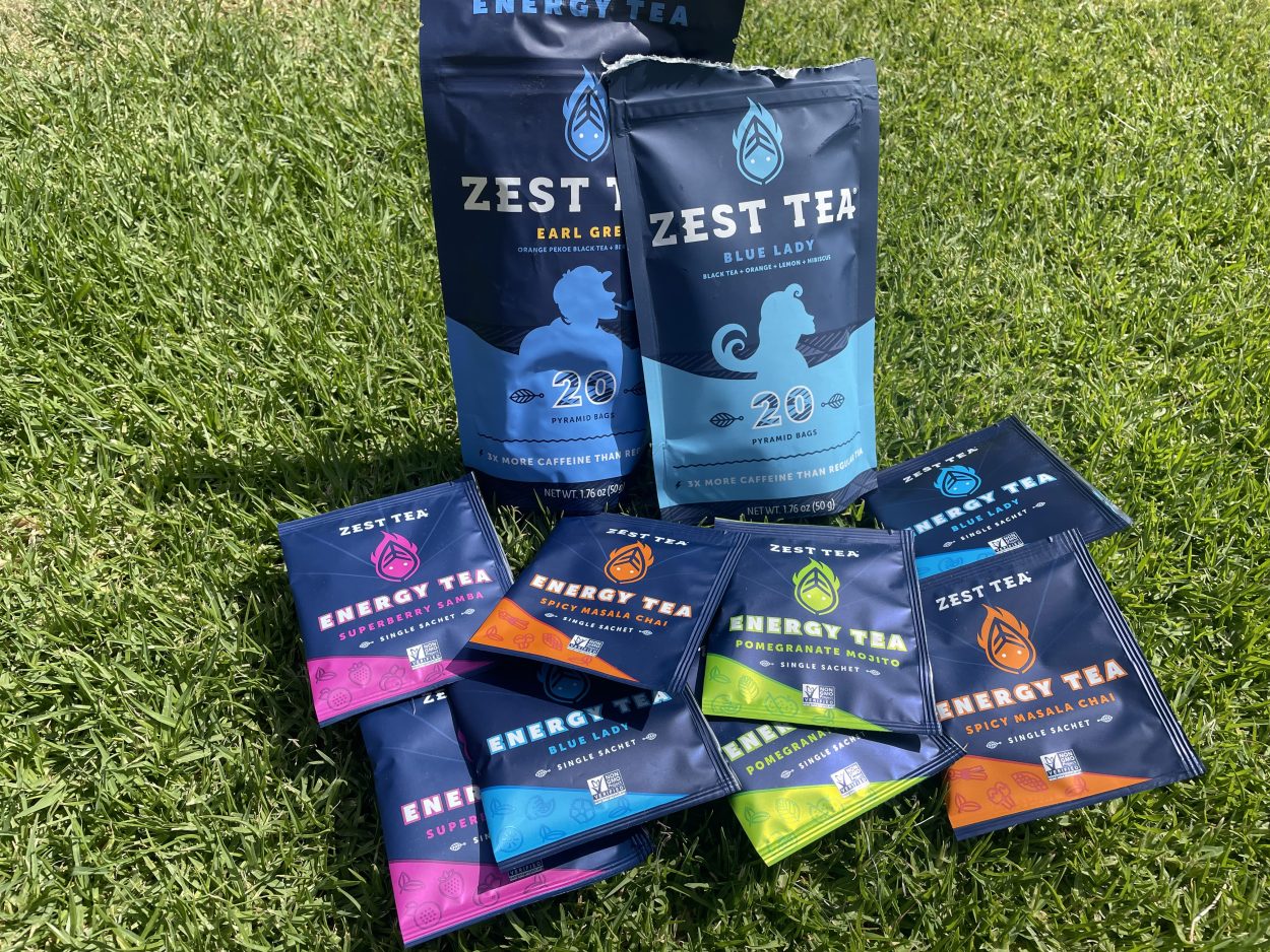 Serving sized packets and Tea bags of Zest Energy Tea in different flavors 