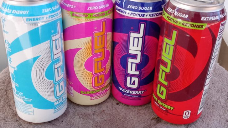 Four cans of G Fuel in different flavors