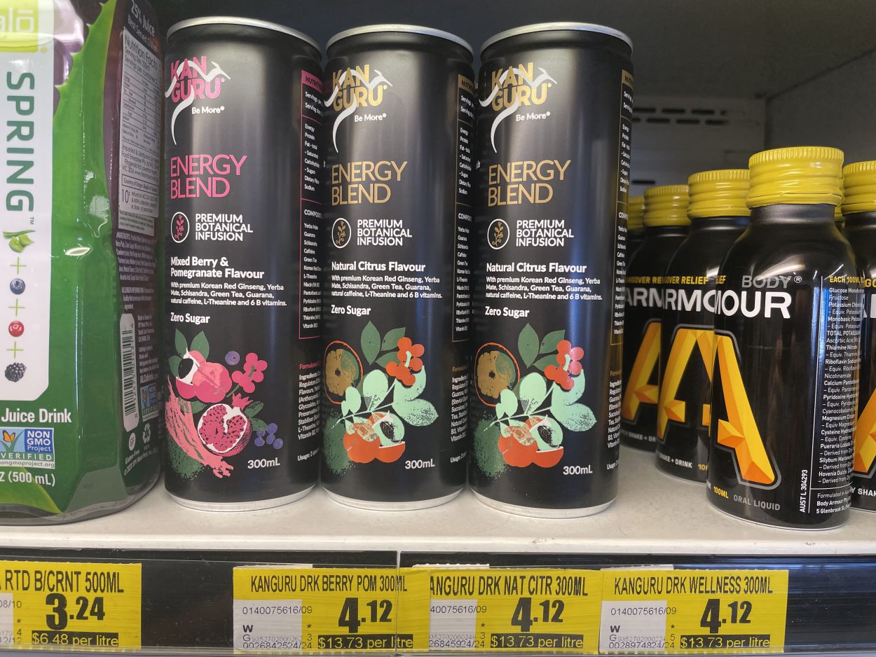 Three cans of Kanguru on a shelf