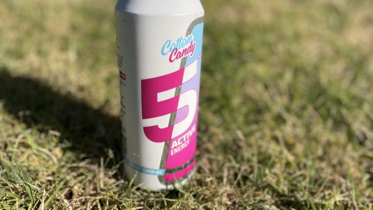 A can of 5 Active placed on the grass
