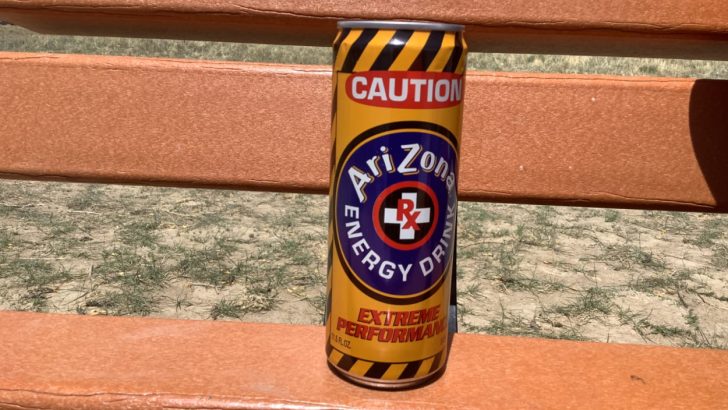 A can Arizona energy drink placed on a bench