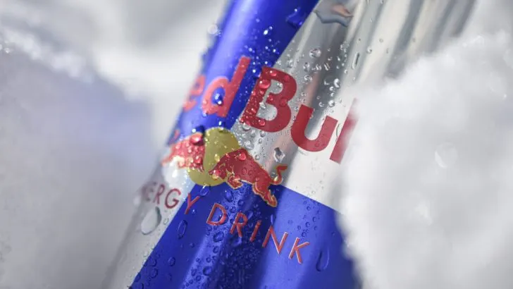 A can of Red Bull Original with water on it