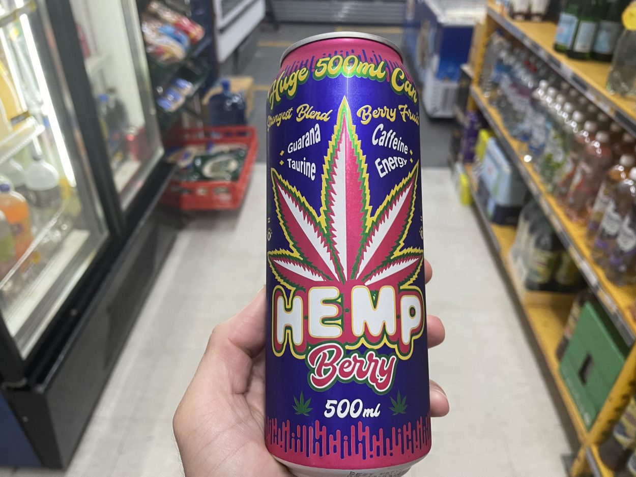A person holding a can of Hemp Berry