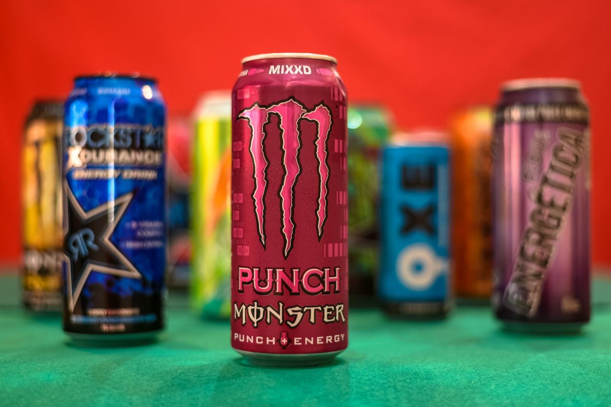 Cans of different energy drinks including Monster and Rockstar